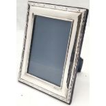 1991 Silver photo frame, by Keyford Frames Ltd, 13 cm wide, 17 cm high, in good used condition.