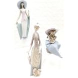Lladro Lady with parasol and dog, 36cm high, 1920's style 'Lady of Nice' 35cm high, t/w seated