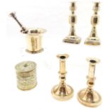 Pair of Brass candlesticks with ejectors, 19.5 cm high, another pair with ejectors, brass string