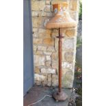Antique vintage standard lamp decorated with pokerwork, with signs of woodworm and replacement