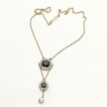 Antique unmarked gold necklet with triple pendant drop set with white sapphire & green paste -
