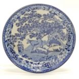 Antique blue & white pearlware saucer with cow & milkmaid decoration - 13.2cm diameter & has small