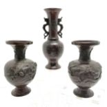Antique Oriental Chinese pair of bronze vases with bird / prunus detail with marks on base in double
