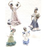 Lladro Pair of Spanish Flamenco dancers 'Olé' 28cm high, Young girl in Flamenco dress holding pot of