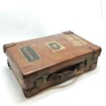 Antique tan leather suitcase by George Perry (Dublin) with travel labels - 54cm x 34cm x 16cm
