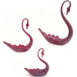 Set of 3 Whitefriars Ruby glass swan's largest 28 cm high, smallest, 17 cm high. all in good