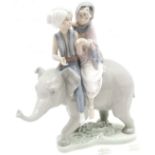 Lladro elephant with 2 Indian children seated on the back 'Hindu children' - 23.5cm high, 19cm wide,