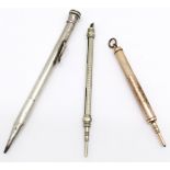 3 x propelling pencils (1 with pen nib end), gilt metal 1918 by Fairchild, silver pencil a/f