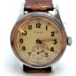 Timor military marked manual wind wristwatch with A.T.P.15386 & crows foot ~ 30mm case - for