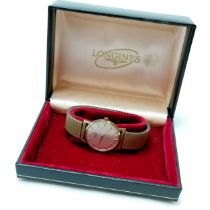 Longines 9ct gold cased manual wind gents wristwatch (32mm case) on a stretchy gold plated