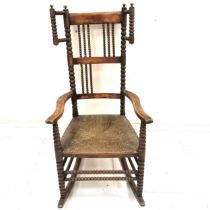 Antique Arts & Crafts (Libertys?) rush seated rocking chair with bobbin turnings - 115cm high x 57cm