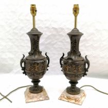 Pair of French spelter table lamps decorated with cherubs, on marble bases, 1 a/f, 50 cm high.