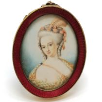 Antique hand painted portrait miniature of a lady with plumed feather hair decoration in a gilt