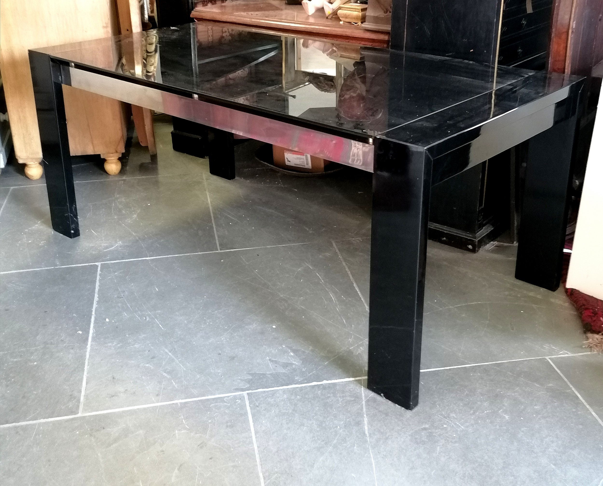 Contemporary black glass topped table, 180 cm wide, 90 cm deep,76 cm deep, Good used condition.