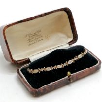 9ct marked gold bracelet set with diamonds - 17cm & 7.4g total weight in an antique retail box