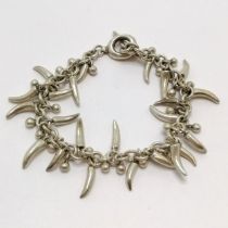 Silver bracelet with fang / bead detail by Kº - 21cm & 46g