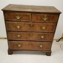Antique walnut chest of 2 short and 3 long crossbanded graduated drawers, on bracket feet, 99 cm