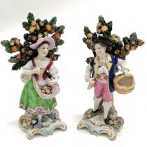 Pair of continental figures with encrusted brocage detail - 16cm high and both are a/f