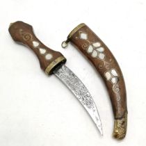 Middle Eastern dagger with engraved blade in a wooden scabbard inlaid with brass and mother of pearl