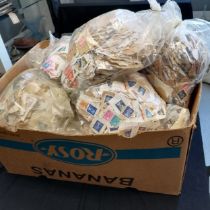 Large lot of kiloware GB stamps - approx 15kg ~ mostly on paper