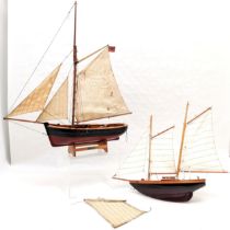 2 Scratch built wooden model sailboats. 61cm high. name plate smack. Has one sail detached but