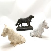 Pair of painted cast metal Scottie dogs, 16 cm high, t/w cast iron St Bernard doorstop, 16 cm