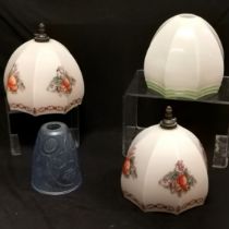 Pair of milk glass shades with floral decoration,16 cm diameter, 14 cm high, another with green