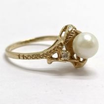 10ct marked gold pearl & white stone ring - size J & 2g total weight