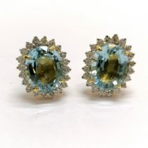 Pair of 18ct marked (on backs) gold aquamarine & diamond cluster earrings - total weight 9.6g ~