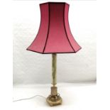 Alabaster and gilded metal lamp, with shade, 55 cm high.