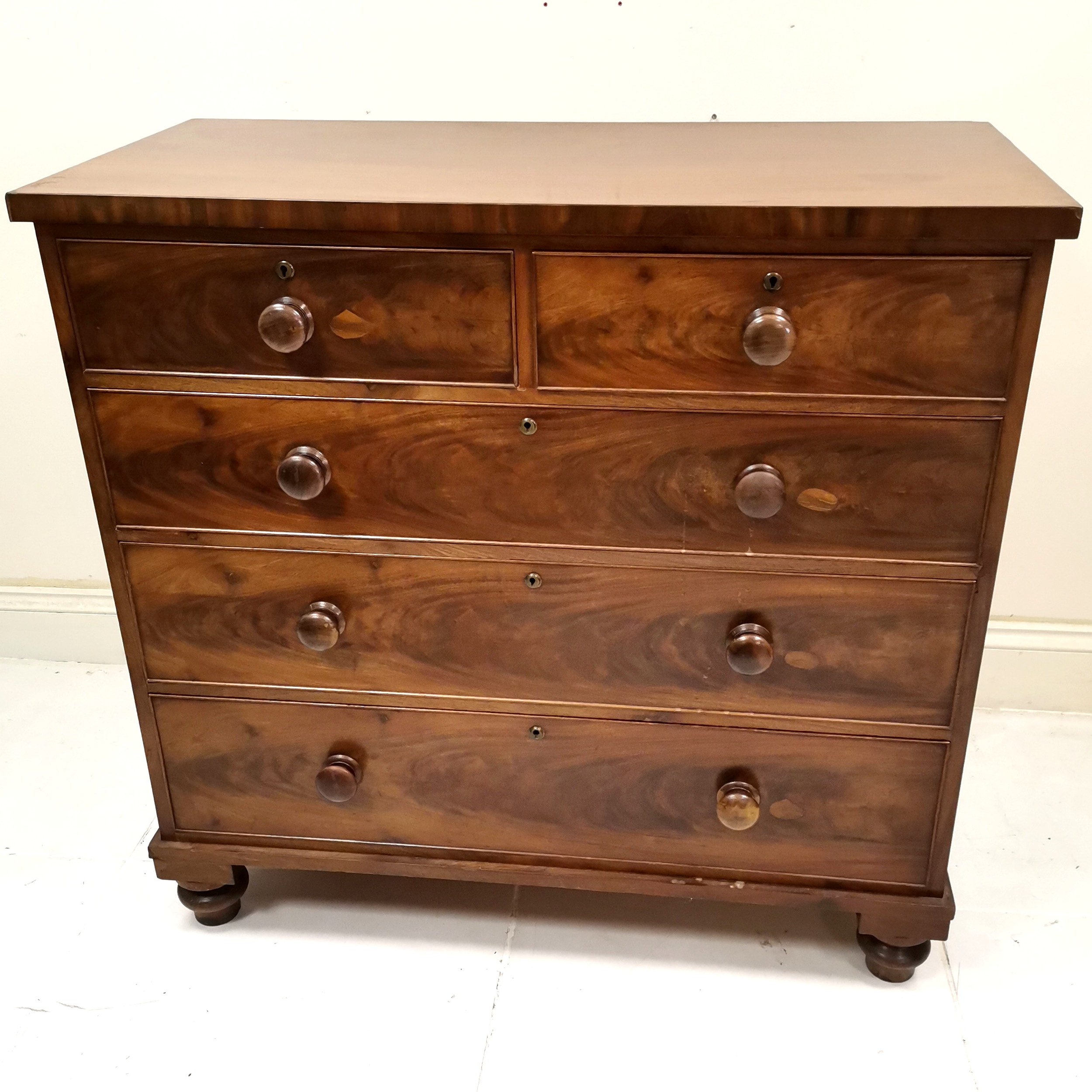 Antique Mahogany chest of 2 short and 3 long graduated drawers, with turned wooden knobs, turned
