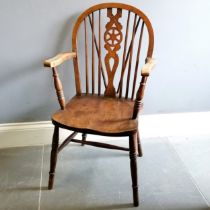 Antique Windsor wheel back Elm carver chair, on turned supports, 46 cm wide, 54 cm deep, 98 cm high,