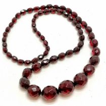 Strand of cherry amber facetted beads - 70cm & 51g