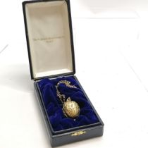 1984 silver gilt walnut pendant watch by St James's House Company on a 60cm silver gilt chain ~