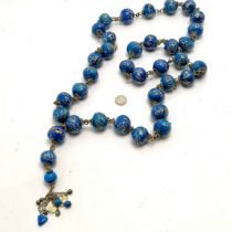 Large scale strand of blue & gilt pottery prayer beads - 160cm with 20cm drop ~ slight loss to 1