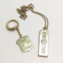1979 silver shield fob key chain by Crisford & Norris Ltd t/w Silver ingot by Carr's of Sheffield