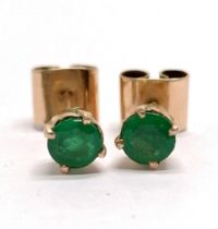 Unmarked gold emerald stud earrings (approx 4mm diameter) - total weight 1.2g - SOLD ON BEHALF OF