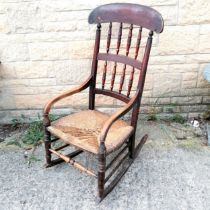 Antique rush seated rocking chair with turned spindle detail - 108cm high x 50cm wide ~ rush seat