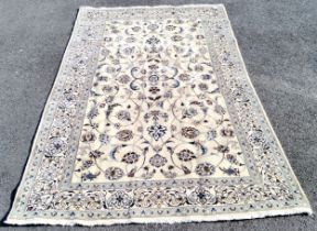 Cream ground rug with all over pattern within floral border, 197 cm wide, 295 cm length, in good