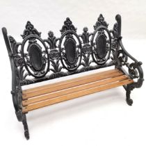 Dolls cast iron and wooden slatted garden bench, 40 cm wide, 20 cm deep, 28 cm high. good condition.