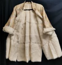 Chinese brocade coat lined with white fur in good condition, 96cm bust