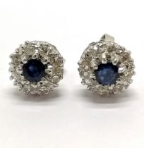 Pair of 18ct hallmarked white gold diamond & sapphire cluster earrings - approx 1cm across & 3.4g