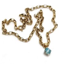 18ct hallmarked gold blue topaz pendant on a 9ct marked gold open link 38cm chain - 7g total weight