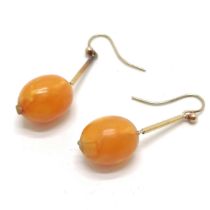Pair of unmarked gold butterscotch amber bead earrings - 3.2cm drop & 2.7g total weight - SOLD ON