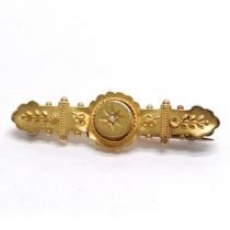 Antique 15ct hallmarked gold brooch set with a diamond - 4cm & 2.7g total weight - has small