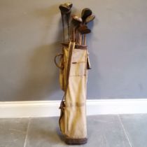 Set of Vintage golf clubs to include a Excelsior Putter etc, contained in canvas and leather mounted