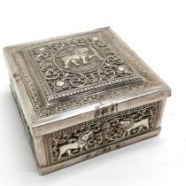 Foreign silver marked table box with repousse decoration and wooden liner 9cm x 9cm x 4.5cm high