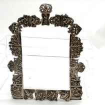 Antique unmarked continental silver frame with unusual construction of cast panels depicting figural