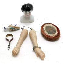 Antique porcelain dolls head, pair of bisque dolls arms, mini advertising corkscrew etc
