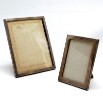 2 x antique silver fronted photograph frames with wooden easel stand backs - largest 21.5cm x 16.5cm